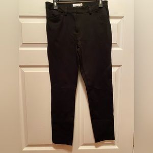 Calvin Klein black fitted, stretchy straight leg pant.  Size 6.